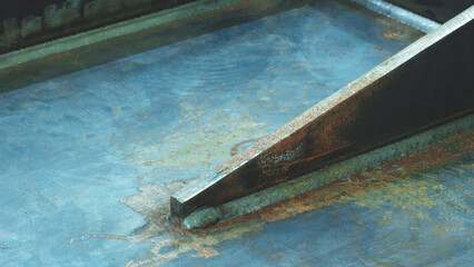 Aufkleber - A weld seam attaches a metal part to another metal surface, metal welding industrial reliability and strength concept background.