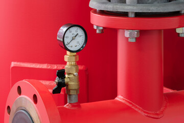 Aufkleber - Stainless steel pipe with a white pressure gauge on it as part of a fire protection system