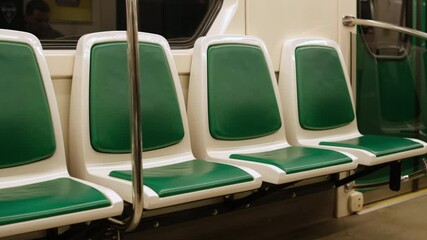 Leinwandbilder - Empty Subway Seats in a Modern Train During Off-Peak Hours in an Urban Area