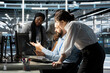 © DC Studio - Data center engineering team doing brainstorming, monitoring system performance using computer, identifying bottlenecks. Server farm coworkers troubleshooting errors, implementing optimizations