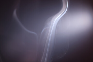 Wall Mural - macro shot of smoke vapour particles release in the air