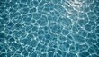 © Tahubulat - Water surface in a pool with ripples and bubbles, creating a textured summer background