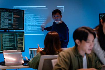 asian software engineer or programmer team working late in development office,problem solving or alg