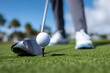 © Emanuel - Golfer hitting a precise tee shot with a driver on the course