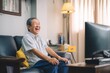 © sogap - Older Korean Man's Delightful Viewing Experience A Portrait of Joy and Television Entertainment in Living Room Setting