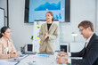 © panomporn - Group of professional business people or accountants working together on financial investment on calculator, doing calculation, analyzing business growth and marketing on graph in modern office.