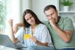 © Antonioguillem - Angry couple paying online at home