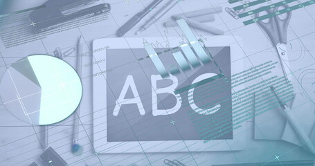 image of infographic interface over digital tablet with abc on screen and stationery on table