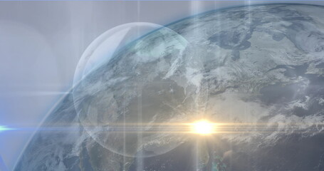 Wall Mural - image of yellow light spot over globe against blue background