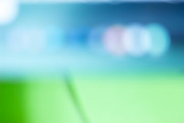 Wall Mural - blue and green blurred backdrop wallaper. bokeh light christmas effect background.