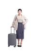 © NETI studio - Portrait of an Asian businesswoman wearing a suit and pulling a suitcase. concept travel,go to work