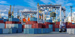 © Grispb - Container cranes and stacked cargo containers at a busy seaport terminal with ships and logistics equipment operating in global shipping. - Port. Customs. Warehouse.