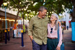 © Rido - Romantic mature couple looking at each other during evening walk