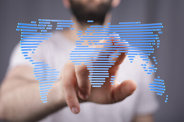 Aufkleber - Abstract image of a person interacting with a digital world map, symbolizing global connectivity and networking.