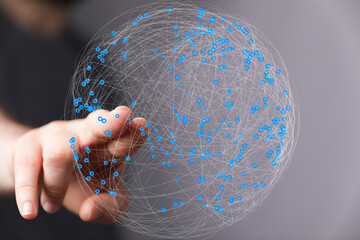 Aufkleber - Abstract image depicting a hand interacting with a digital sphere representing global network connections.