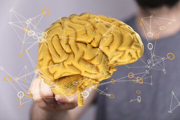 Aufkleber - Abstract image of a golden brain with glowing neural network connections. Represents intelligence, AI, and innovation.