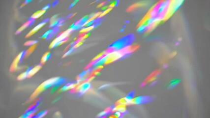 Wall Mural - dreamy holographic rainbow light refraction texture overlay with abstract soft bokeh effect on a whi