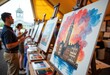 © starush - Artists displaying their watercolor paintings at an outdoor art fair