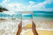 © Studium L&M - Tablet displaying beach scene in a perfect summer vacation setting, ideal for e-book mockup and digital content.