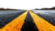 © Spartan - Wet asphalt road with yellow dividing lines