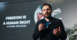 © peopleimages.com - Man, presentation and human rights at convention on stage for talk, freedom or info at event. Person, public speaking and discussion at global conference for equality, accountability or peace in Gaza