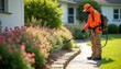 © Maryna - Pest control technician applying treatment to lawn, garden to protect from pests. Man in protective workwear spraying insecticide. Pro pest control service, spring summer. Prevent damage, safe
