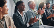 © peopleimages.com - Conference, happy business people and applause for success, well done and thank you. Seminar, group and clapping for presentation, praise and public speaking with celebration for goal achievement