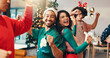 © peopleimages.com - Happy people, Christmas and dancing with friends for party or new year celebration at home. Excited, group or energy with smile for December holiday, festive event or fun get together at house