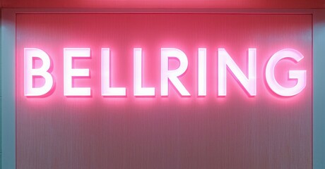 Poster - Bright pink neon sign spells BELLRING. Background features subtle red gradient, framed by silver trim. Minimalist design, modern aesthetic.