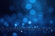 © Suradech - Deep blue bokeh, sparkling glitter, festive glow, vibrant, background
