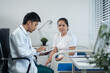 © NINENII - Doctors use a service fee calculator to save money on health insurance, drug cost concepts..
