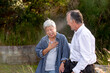 © Austockphoto - Happy senior woman laughing with one hand on her chest