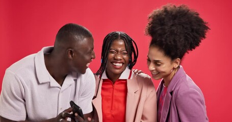 Poster - Friends, group and phone with laughing in studio with smile, meme or funny video by red background. African people, man and women with smartphone, joke and mobile app for sharing post on social media