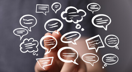 Poster - Hand interacting with floating speech bubbles,concept of communication, ideas, and conversation.
