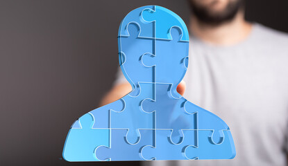 Aufkleber - Abstract image of a person made of puzzle pieces. Represents teamwork, collaboration, and unity.