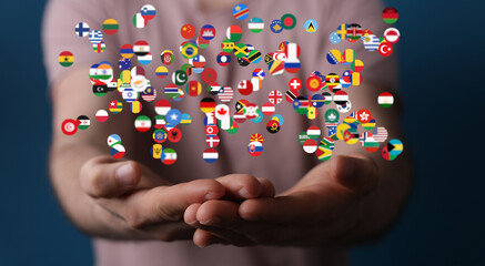 Poster - Image of hands gently holding numerous flags, symbolizing international collaboration and global connections.