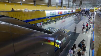 Wall Mural - top down timelapse view of crowded passenger get on and get off from subway train while train arrive