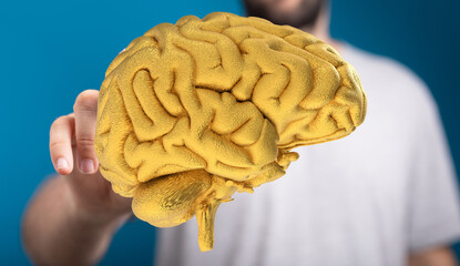 Leinwandbilder - Conceptual image of a golden brain. Represents intelligence, innovation, and creative thinking.