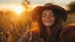 © Pinklife - A serene woman in a sunlit field radiates joy and tranquility, embodying a connection with nature, warmth, and a peaceful spirit during sunset's golden hour.