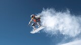 Snowboarder in Mid-Air with Snow Spray and Blue Sky