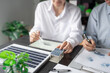 © Charlie's - Solar panels green energy Business man working green eco friendly office business creative idea Planing Bio economy for business eco friendly professional Engineer sustainable electricity.