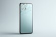 © Larisa - Smartphone with shattered screen symbolizes disruption in techno