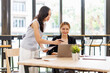 © David - Finance and investment concept. Two Business asian women analyzing market data, financial graph report, economic growth, business strategy, planning and solution, risk management