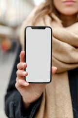 Aufkleber - Woman Holding Blank Smartphone Screen Outdoors in Winter, Showcasing Mobile Technology and Digital Marketing Opportunities : Generative AI