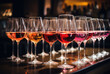 © Pinklife - This sophisticated image displays an array of beautiful wine glasses filled with colorful beverages, creating a refined and inviting atmosphere ideal for social gatherings.