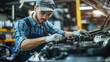 © SS Digital - Engineer or technician working with car battery module in laboratory