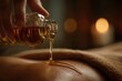 © whitestorm - Close up of a woman receiving a relaxing aroma therapy massage with essential oil, gently poured on the body, promoting wellness and stress relief in a spa setting.