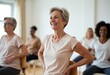 © starush - Senior women participating in a fitness or wellness class with a joyful expression