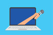 © danijelala - Hand extends a microphone from a laptop monitor
