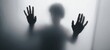 © Studio Nova - The figure pressing hands against foggy glass in a mysterious setting